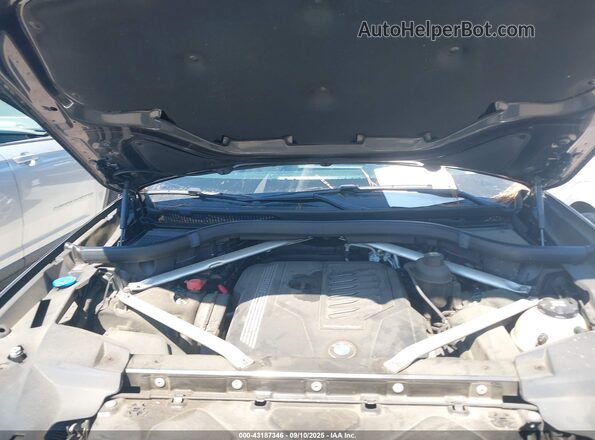 5UXCW2C04L9A03438 2020 BMW X7 Black Rear view