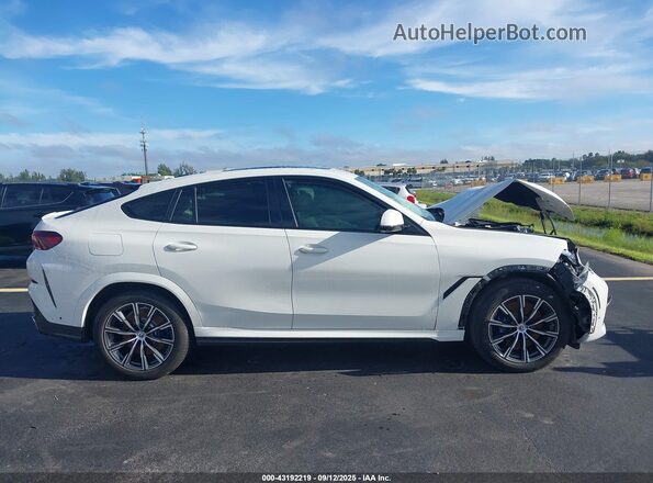 5UXCY4C00L9C89228 2020 BMW X6 White Вид задньої частини салону