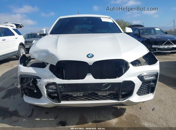 5UXCY8C06L9B21844 2020 BMW X6 White Widok wnętrza z tyłu