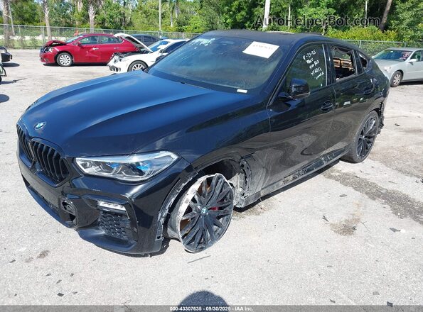 5UXCY8C09M9F44368 2021 BMW X6 Black Front left