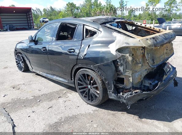 5UXCY8C09M9F44368 2021 BMW X6 Black Rear left