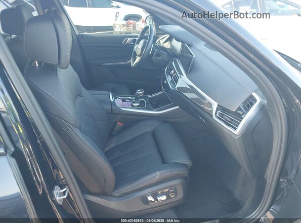 5UXJU4C05P9R34722 2023 BMW X5 Black Вид салону спереду