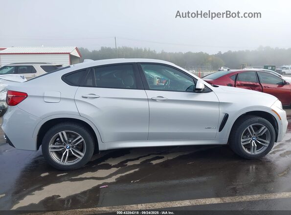 5UXKU2C53K0Z64335 2019 BMW X6 Silver Vista interior trasera