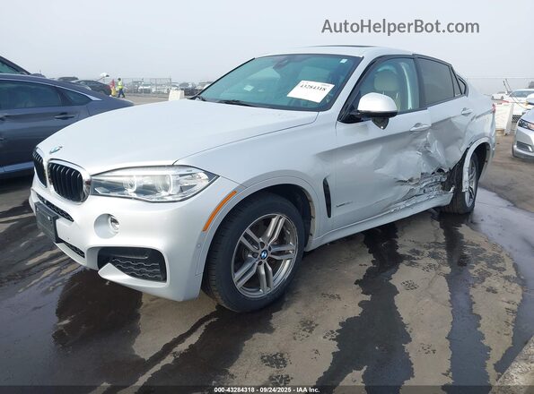 5UXKU2C53K0Z64335 2019 BMW X6 Silver Vista tres cuartos delantera izquierda
