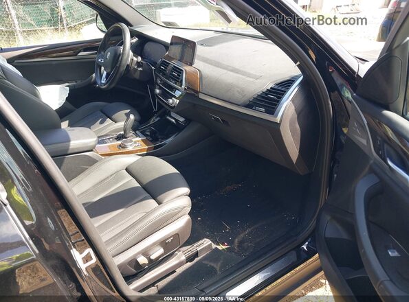 5UXTY5C02LLT32182 2020 BMW X3 Черный Вид салона спереди