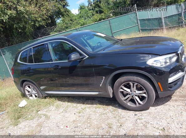5UXTY5C02LLT32182 2020 BMW X3 Черный Вид задней части салона