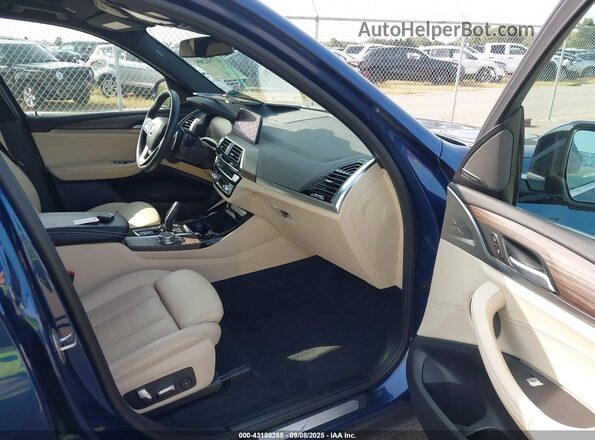 5UXTY5C04LLT39019 2020 BMW X3 Blue Vista interior delantera