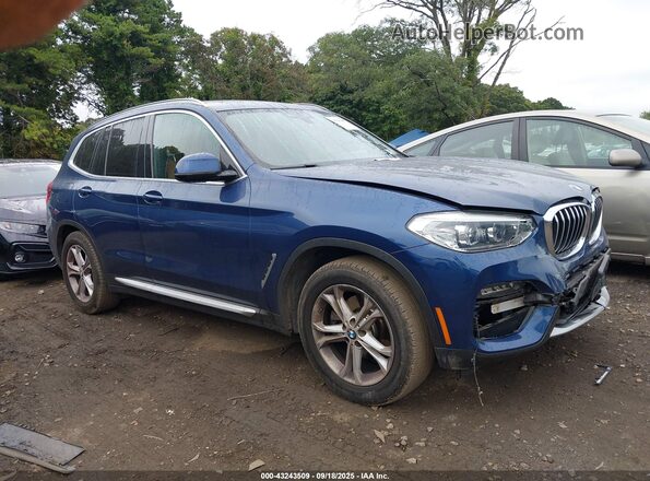 5UXTY5C05M9G83864 2021 BMW X3 Blue Vista interior trasera