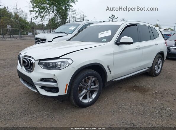 5UXTY5C08M9E71248 2021 BMW X3 White Front left