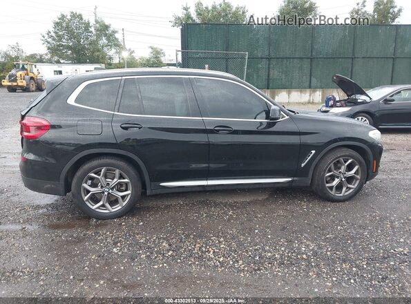 5UXTY5C08M9F11151 2021 BMW X3 Black Սալոնի հետևի տեսք