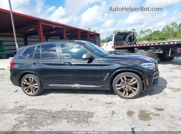 5UXTY9C08L9B83588 2020 BMW X3 Черный Вид задней части салона