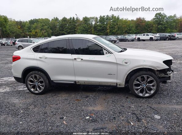 5UXXW3C54J0T80997 2018 BMW X4 Белый Вид задней части салона