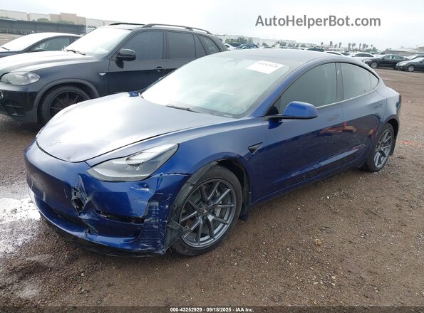 5YJ3E1EB1NF267512 2022 TESLA MODEL 3 Blue Передня ліва чверть