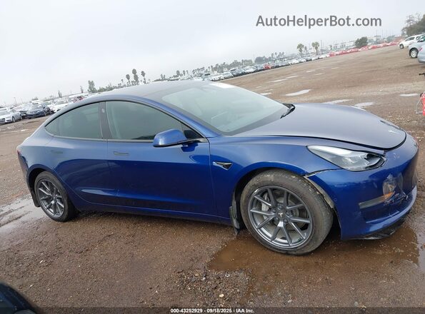 5YJ3E1EB1NF267512 2022 TESLA MODEL 3 Blue Вид задньої частини салону