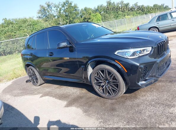 5YMJU0C03M9D99745 2021 BMW X5 Black Vista interior trasera