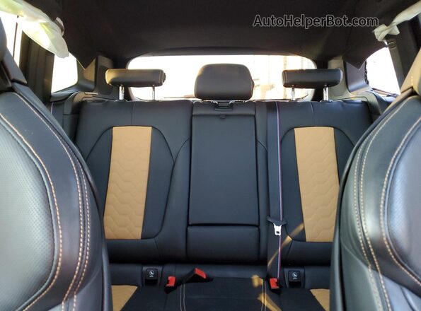5YMTS0C04M9G46933 2021 BMW X3 Black Rear seats view