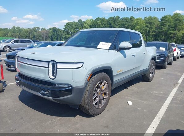 7FCTGAAA6NN015709 2022 RIVIAN R1T Gray Առջևի ձախ երեք քառորդ տեսարան