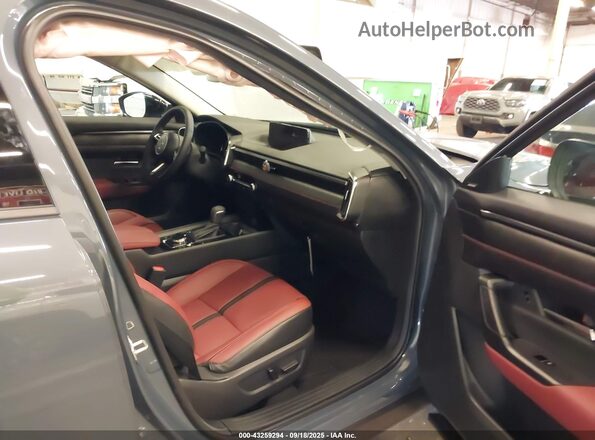 7MMVAAEW1SN115167 2025 MAZDA CX-50 HYBRID Blue წინა სალონის ხედი