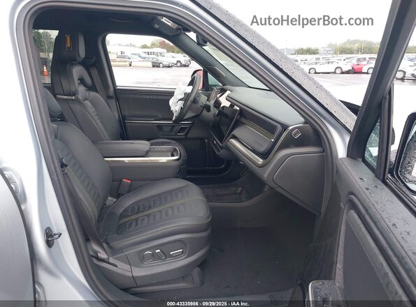7PDSGABA3RN036435 2024 RIVIAN R1S Gray Vista interior delantera