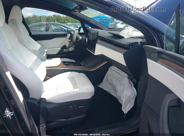 7SAXCAE52PF366749 2023 TESLA MODEL X Black Вид салону спереду