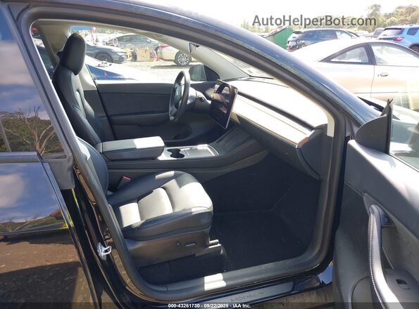7SAYGAEE5NF385091 2022 TESLA MODEL Y Black წინა სალონის ხედი