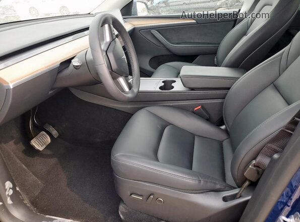 7SAYGDEDXRA327568 2024 TESLA MODEL Blue Front interior view
