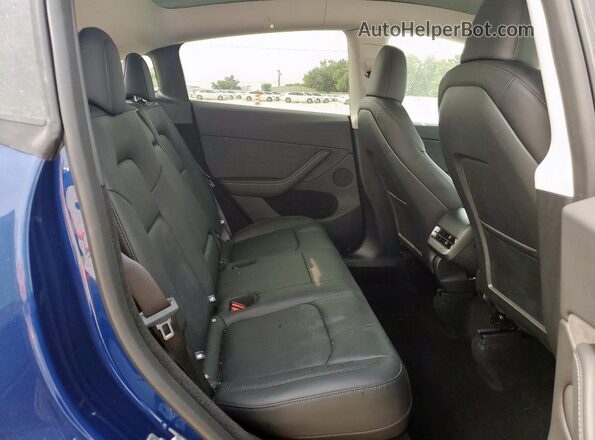 7SAYGDEDXRA327568 2024 TESLA MODEL Blue Rear interior view
