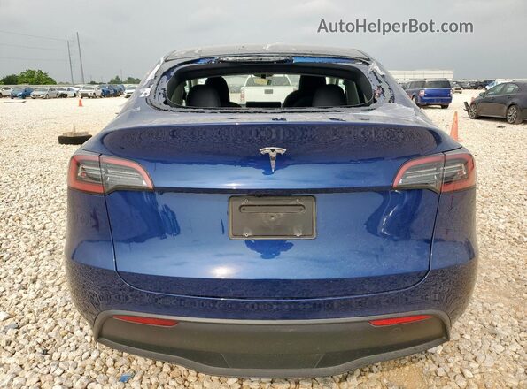 7SAYGDEDXRA327568 2024 TESLA MODEL Blue Rear view