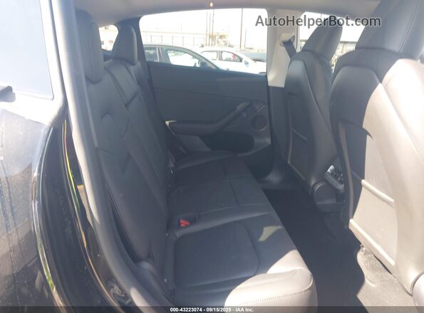 7SAYGDEE1RF176891 2024 TESLA MODEL Y Black VIN კოდის სტიკერის ხედი