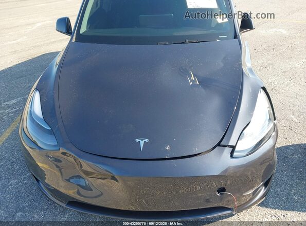 7SAYGDEE2SA361941 2025 TESLA MODEL Y Gray Widok wnętrza z tyłu