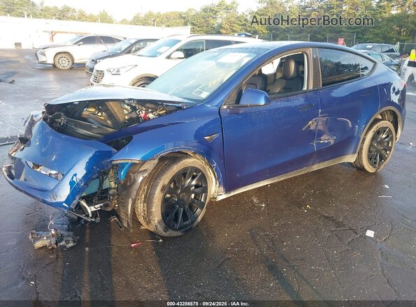 7SAYGDEE3PA123457 2023 TESLA MODEL Y Blue Przód lewy