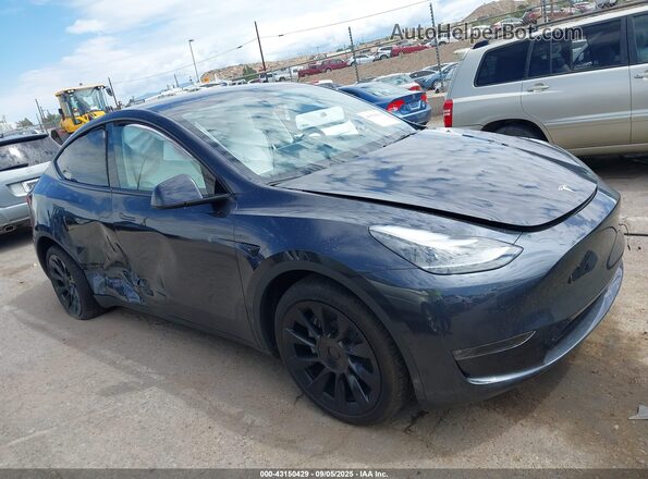 7SAYGDEE5RA225345 2024 TESLA MODEL Y Серый Вид задней части салона