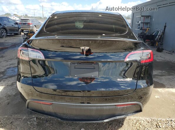 7SAYGDEF3SA369877 2025 TESLA MODEL Black Հետևի տեսք