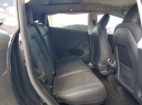 7SAYGDEF3SA369877 2025 TESLA MODEL Black Հետևի նստատեղերի տեսք