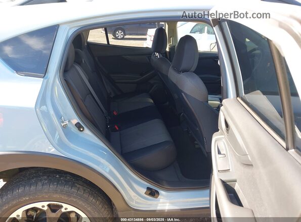 JF2GTAAC3M9665658 2021 SUBARU CROSSTREK Light Blue Widok naklejki z numerem VIN