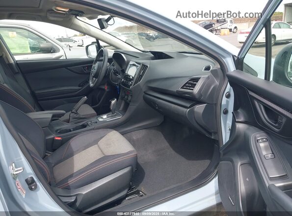 JF2GTADC7JH312479 2018 SUBARU CROSSTREK Light Blue წინა სალონის ხედი