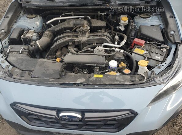 JF2GTHSCXNH229646 2022 SUBARU CROSSTREK Blue Vista del compartimento del motor