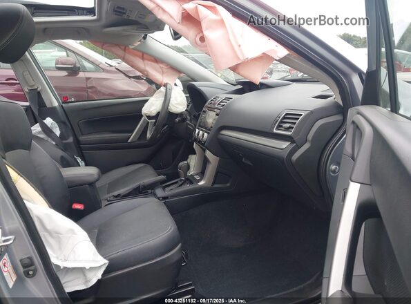 JF2SJAXC0GH515055 2016 SUBARU FORESTER 2.5I TO Silver Front interior view