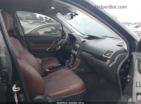 JF2SJGWC3JH557229 2018 SUBARU FORESTER2. Black Front interior view