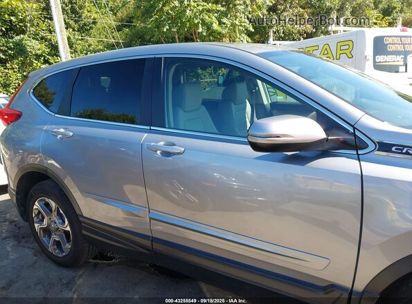 JHLRW2H82KX001367 2019 HONDA CR-V Silver Rear interior view