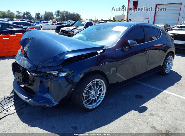 JM1BPAKL7M1306825 2021 MAZDA 3 Blue Front left