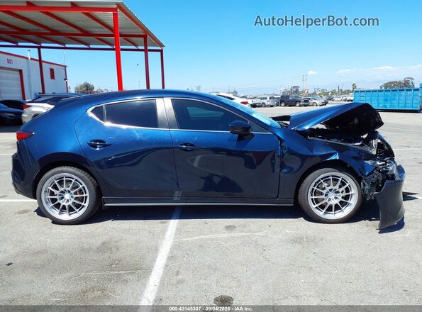 JM1BPAKL7M1306825 2021 MAZDA 3 Blue Rear interior view