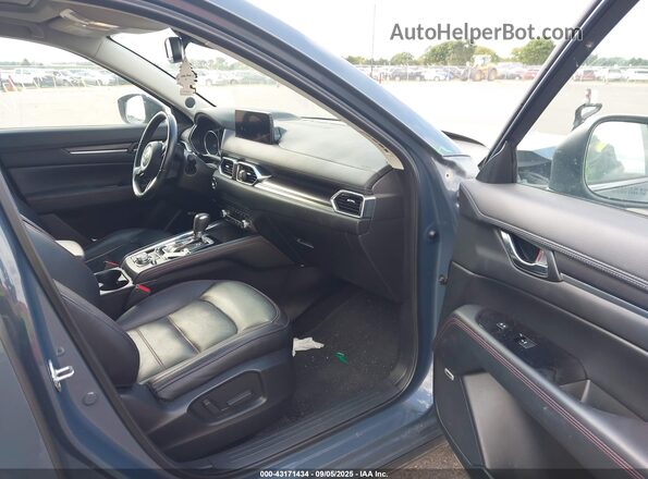 JM3KFBCY5M0370975 2021 MAZDA CX-5 Blue Front interior view