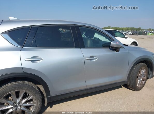 JM3KFBDM2M0390726 2021 MAZDA CX-5 Gray Vista interior trasera