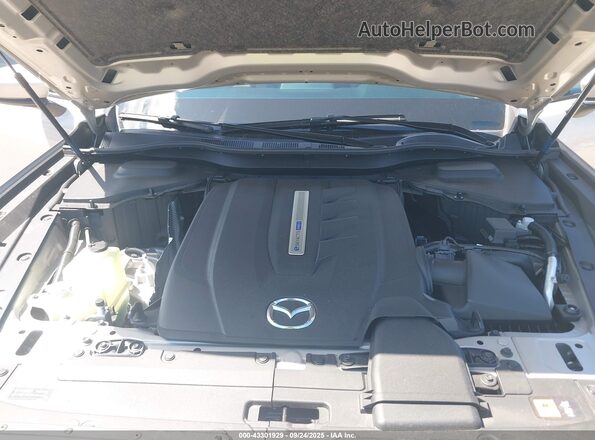 JM3KKBHA1S1196675 2025 MAZDA CX-90 PHEV Gold Вид ззаду