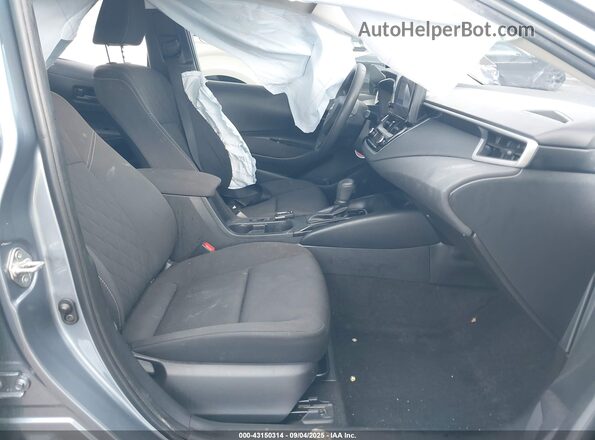 JTDB4MEE5PJ000962 2023 TOYOTA LL Gray Vista interior delantera