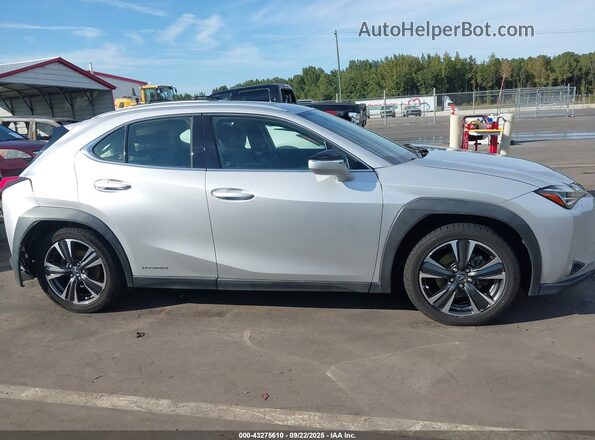 JTHU9JBH4K2010326 2019 LEXUS UX 250H Silver Rear interior view