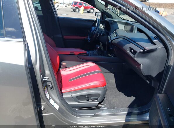 JTHU9JBH8K2010619 2019 LEXUS UX 250H Gray Front interior view