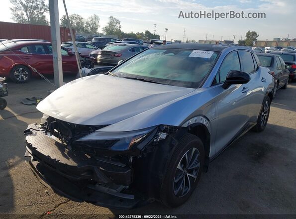JTJAAAAB4PA020132 2023 LEXUS RZ 450E Серебряный Передняя левая четверть