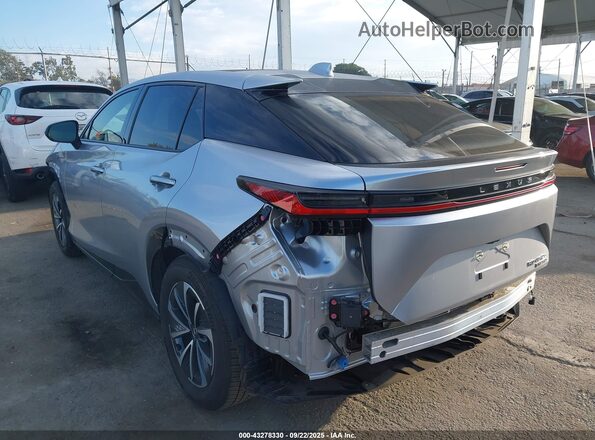 JTJAAAAB4PA020132 2023 LEXUS RZ 450E Серебряный Задняя левая четверть